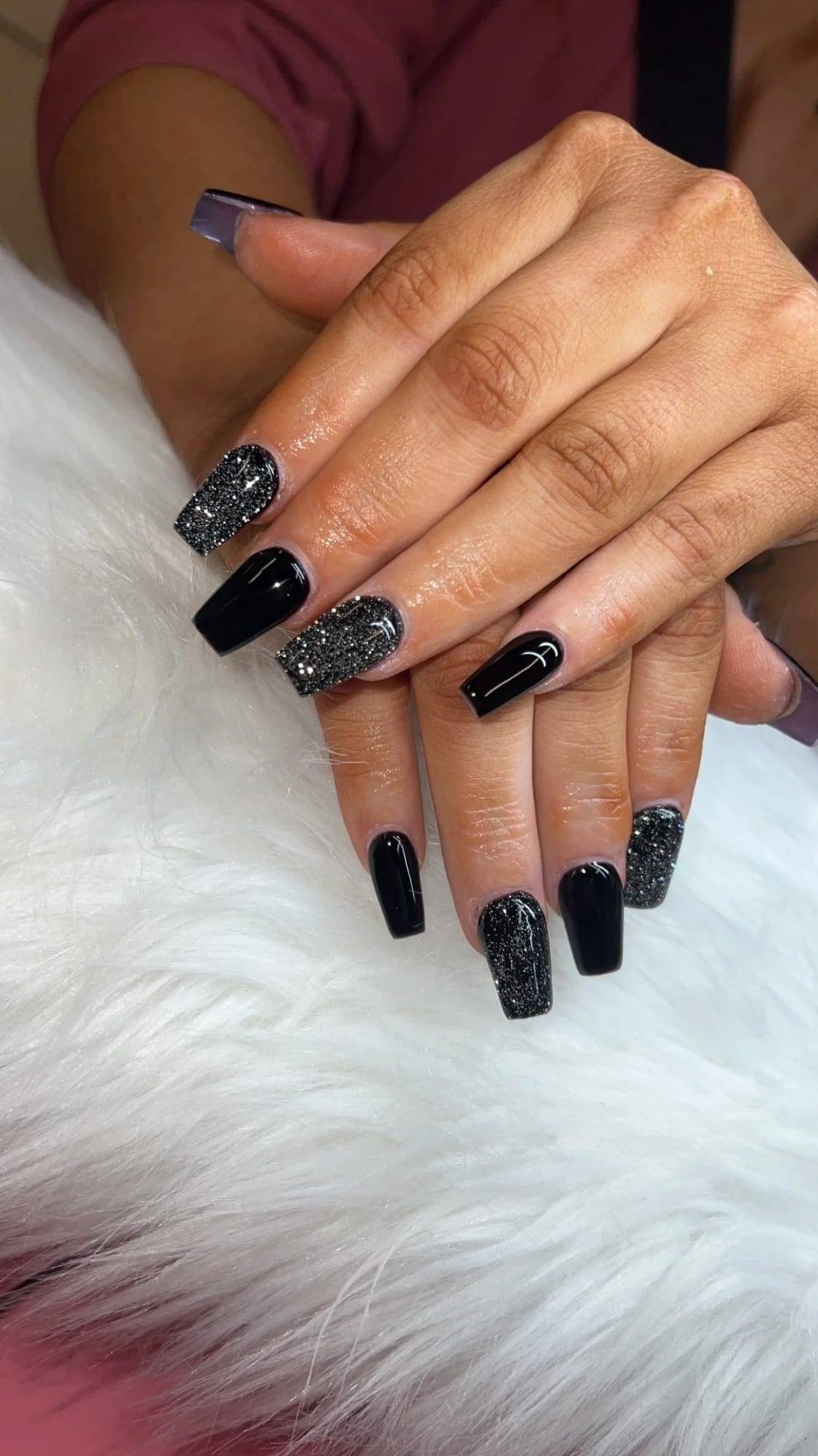 Black square acrylics with silver glitter accent nails