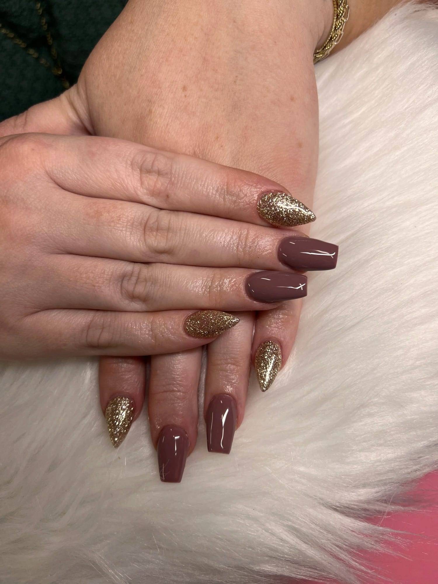 Chocolate brown coffin nails with gold glitter accent