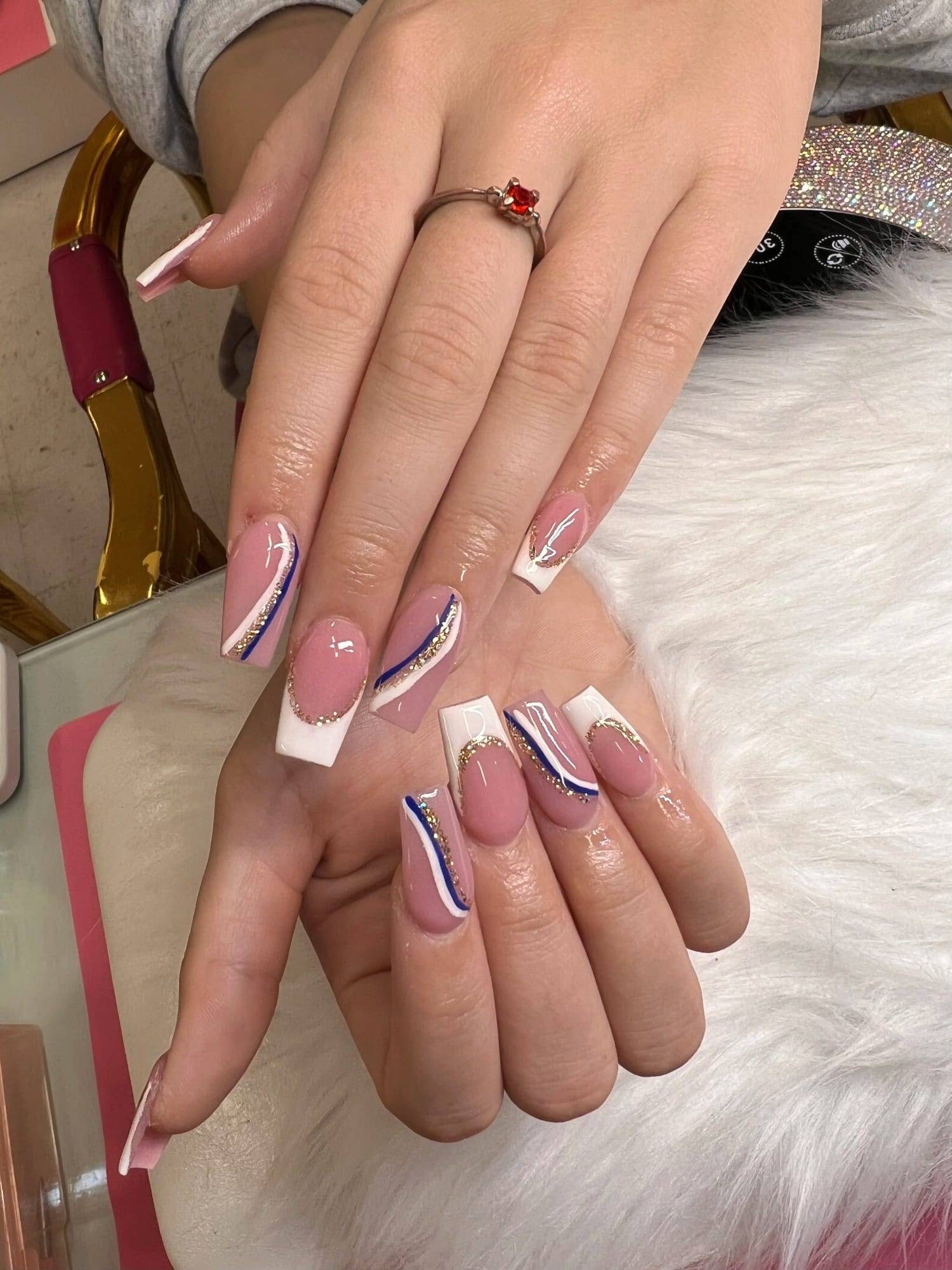 Clear nude nails with pink and purple swirl line art